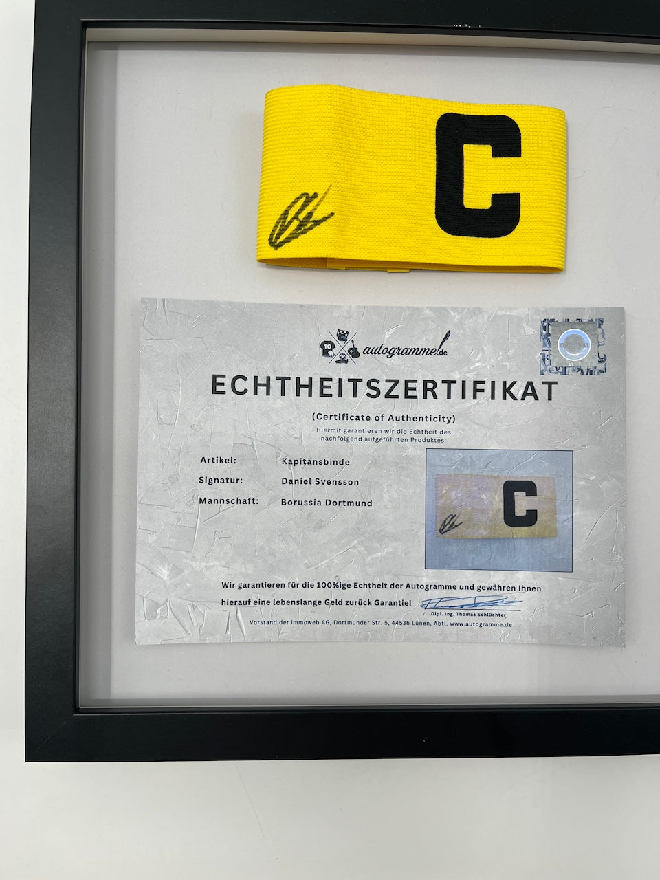 Captain's armband signed by Daniel Svensson as part of the Borussia Dortmund COA