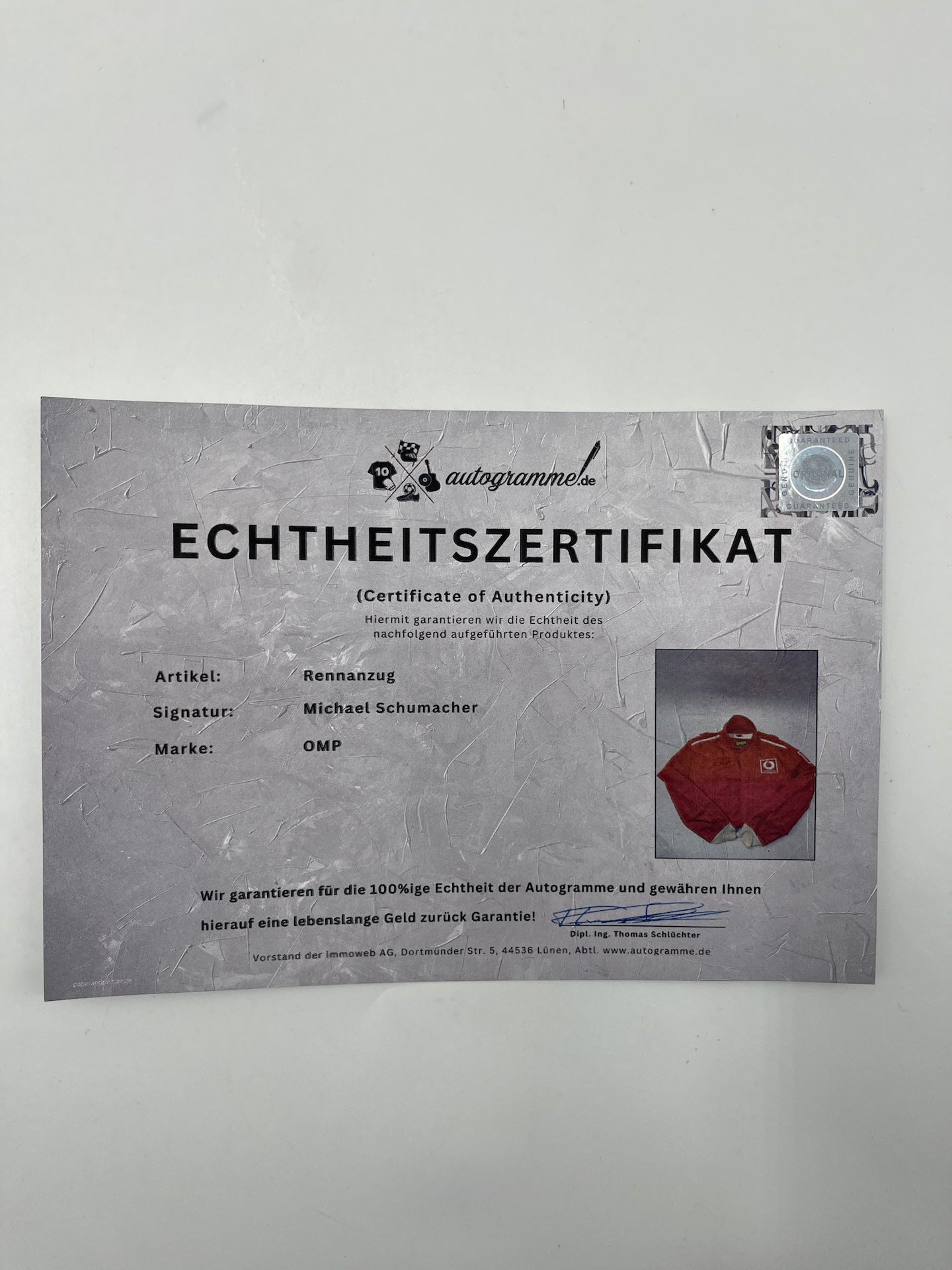 OMP Rennanzug signiert von Michael Schumacher Autogramm