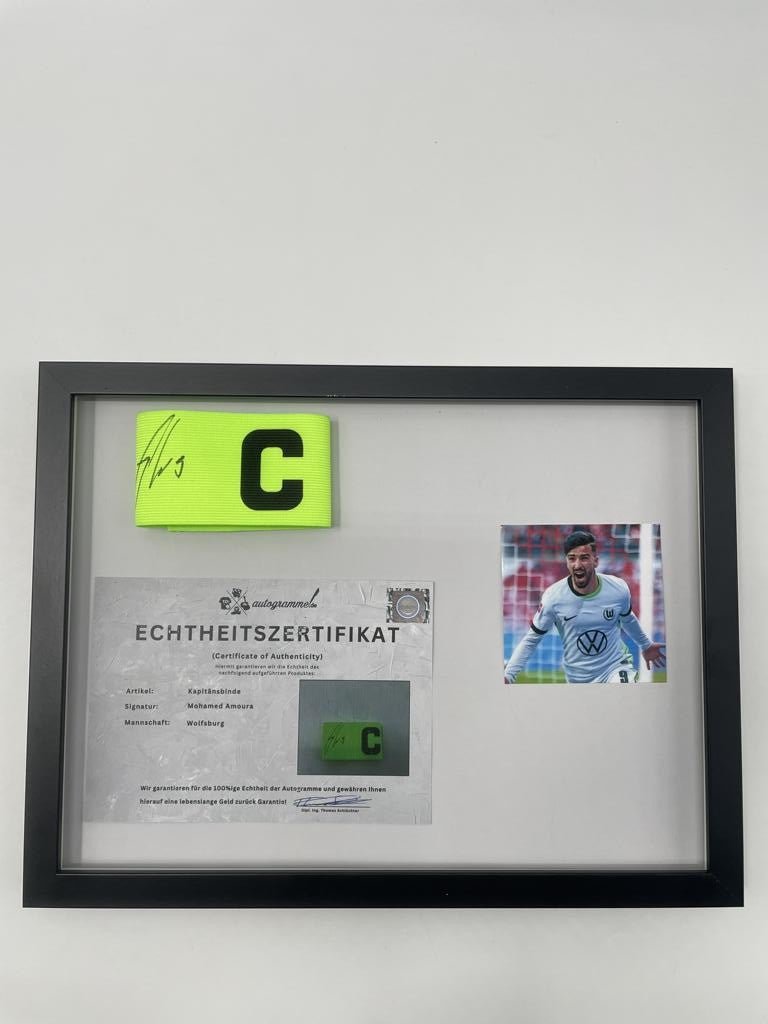 Captain's armband signed by Mohamed Amoura in a Wolfsburg frame, autograph COA