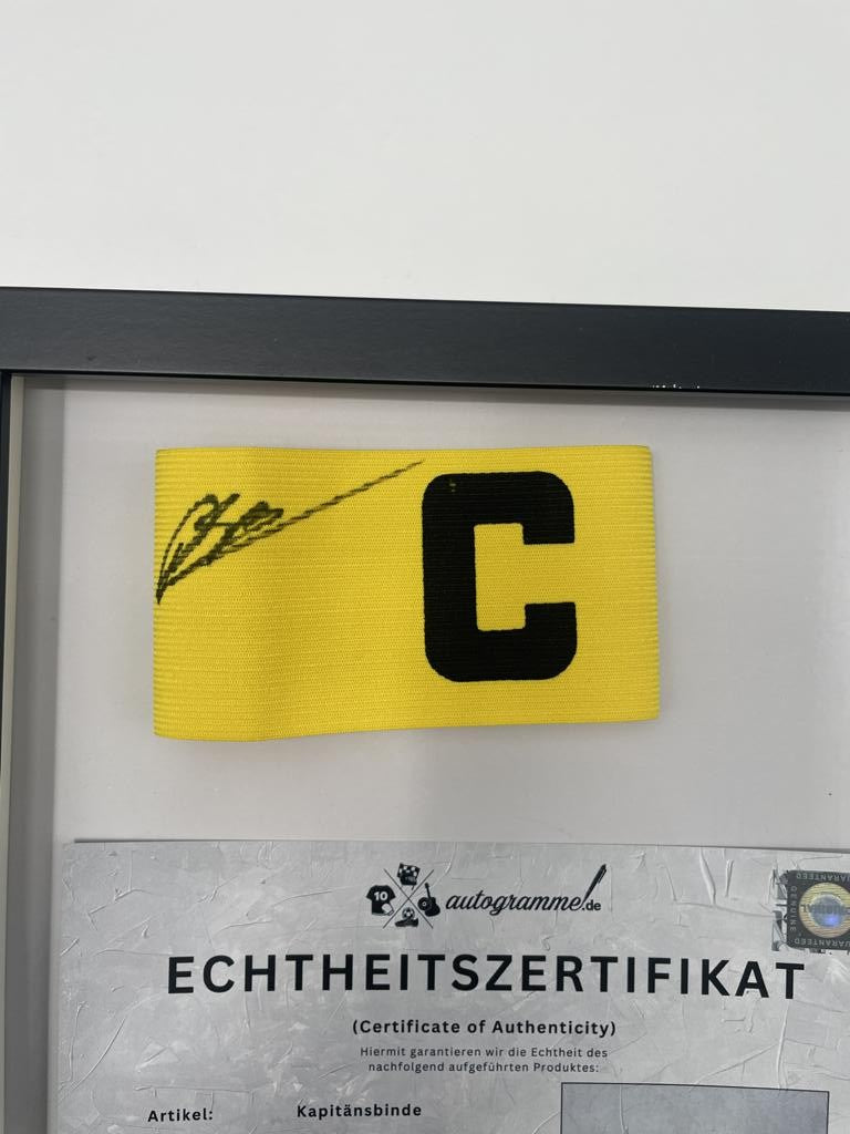 Captain's armband signed by Daniel Svensson in a Borussia Dortmund autograph COA frame
