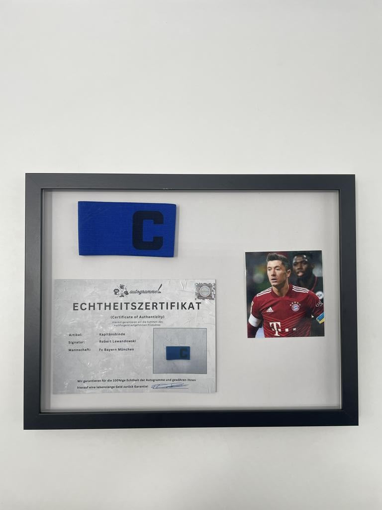 Captain's armband signed by Robert Lewandowski in a frame FC Bayern Munich football autograph