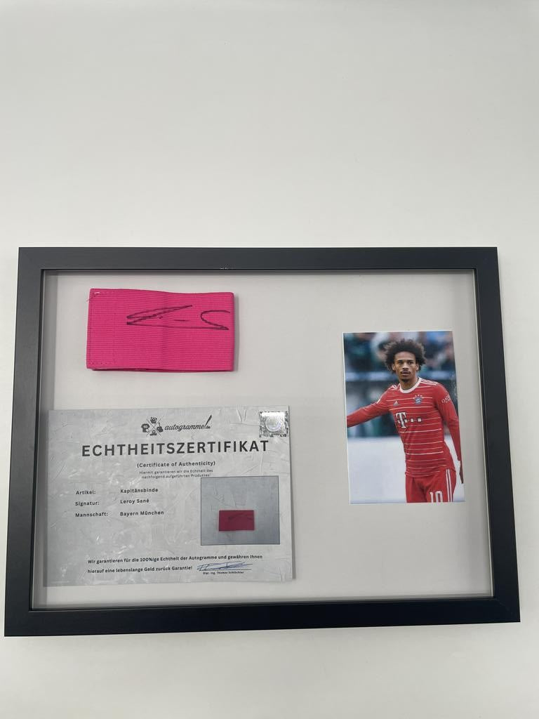 Captain's armband signed by Leroy Sane in a Bayern Munich autograph frame