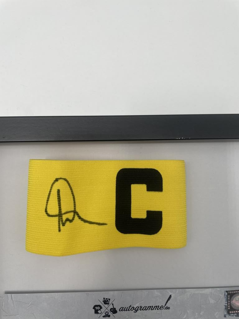 Captain's armband signed by Hans-Joachim Watzke as part of the Borussia Dortmund COA