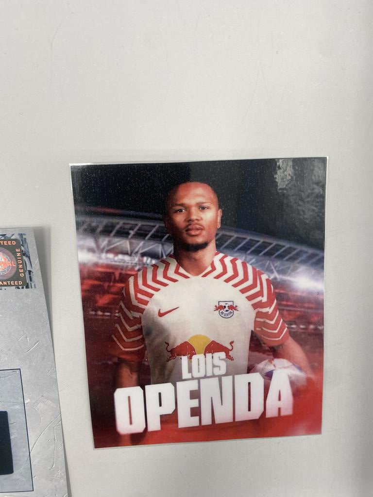 Captain's armband signed by Lois Openda in a framed RB Leipzig autograph