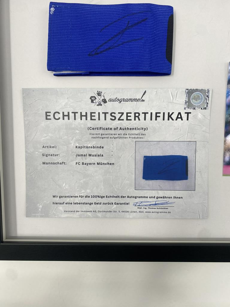 Captain's armband signed by Jamal Musiala in a Bayern Munich football autograph frame