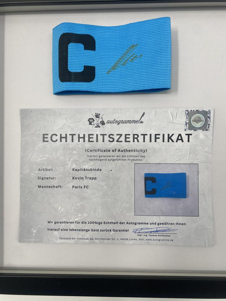 Captain's armband signed by Kevin Trapp in a Paris FC autograph COA frame