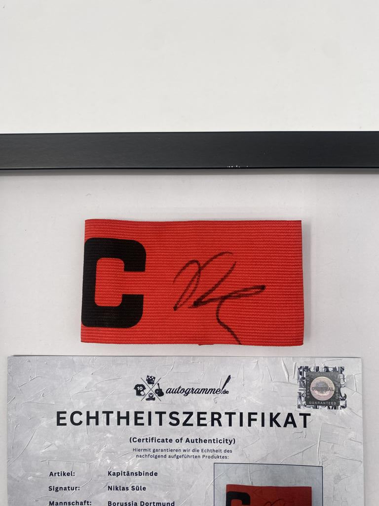 Captain's armband signed by Niklas Süle as part of the Borussia Dortmund COA football campaign