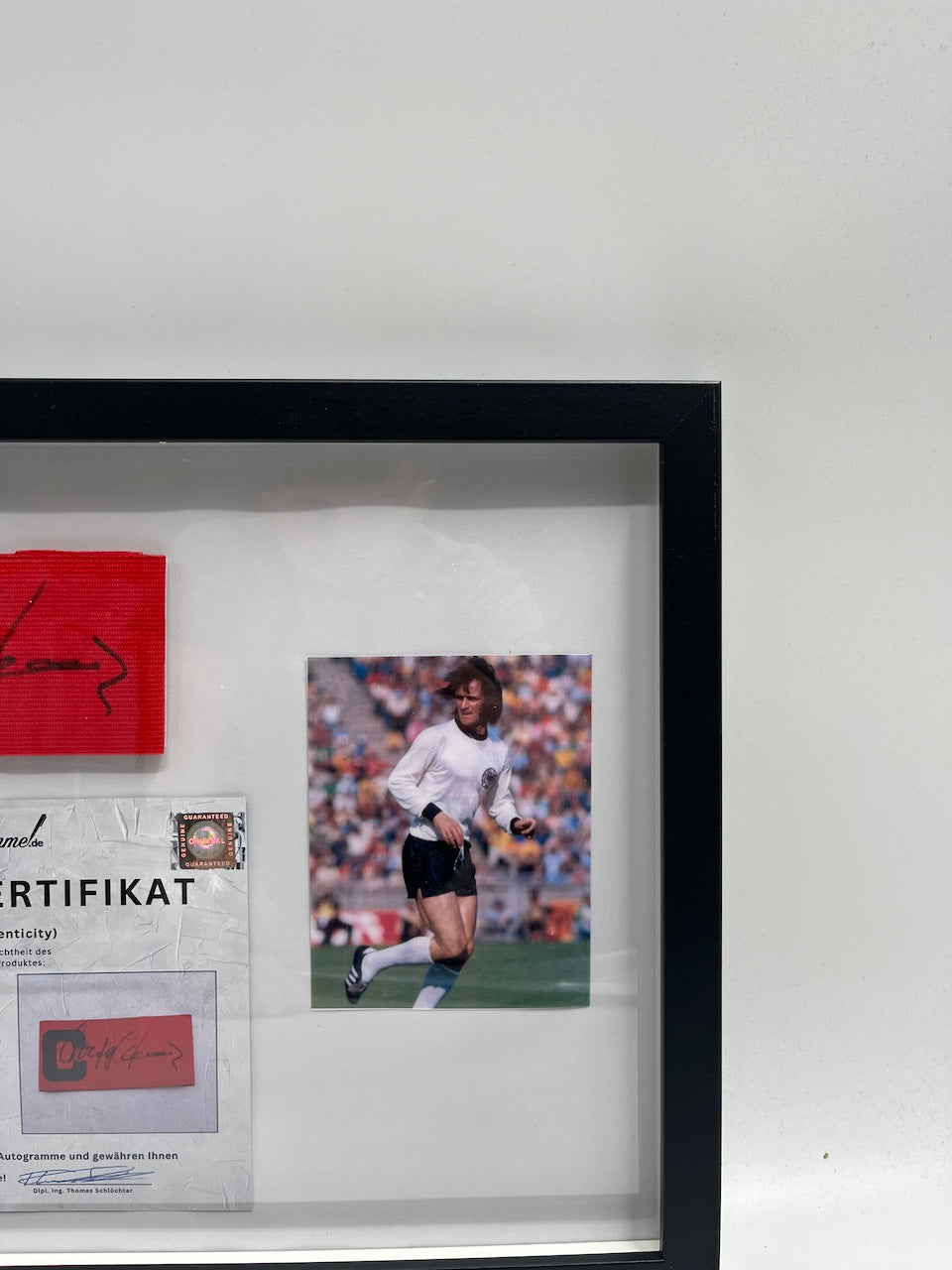 Kapitänsbinde Wolfgang Overath signiert im Rahmen DFB Fußball Autogramm COA