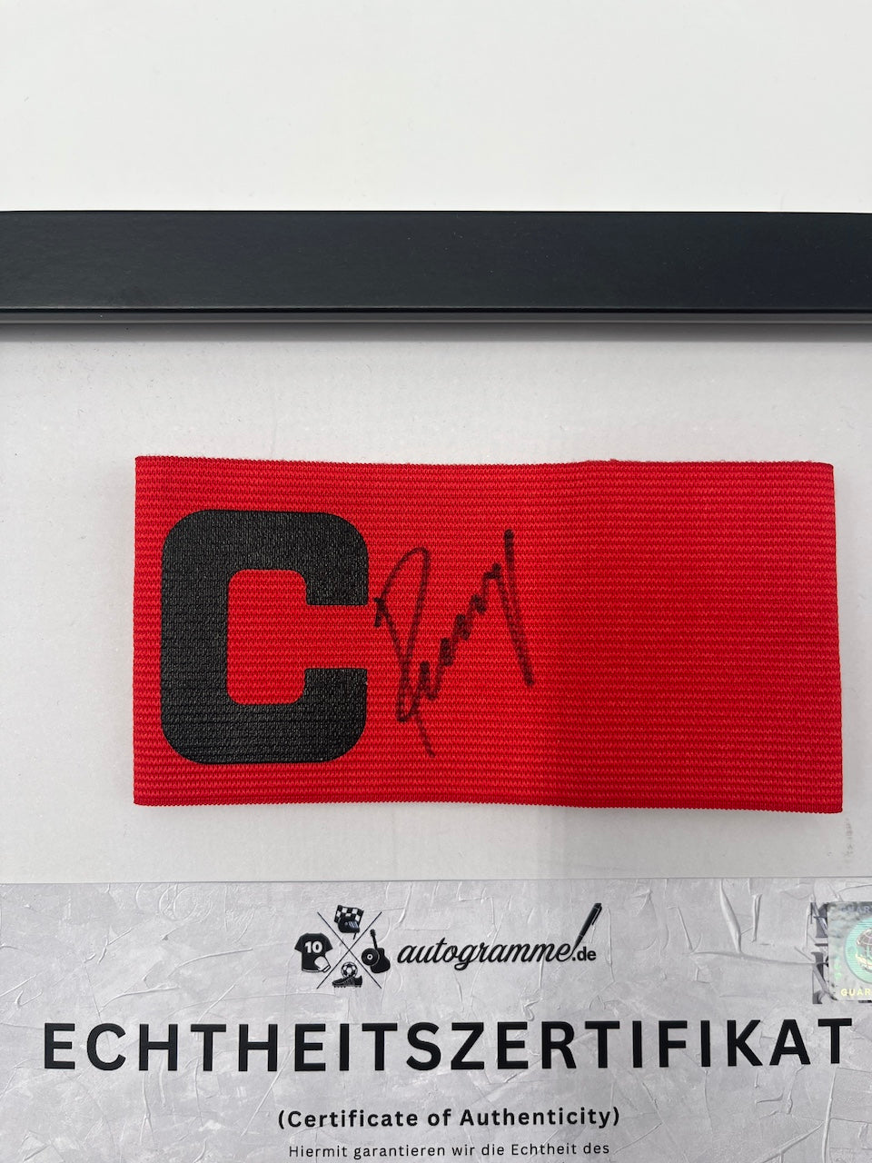 Captain's armband signed by Karl-Heinz Rummenigge in a DFB autograph COA frame