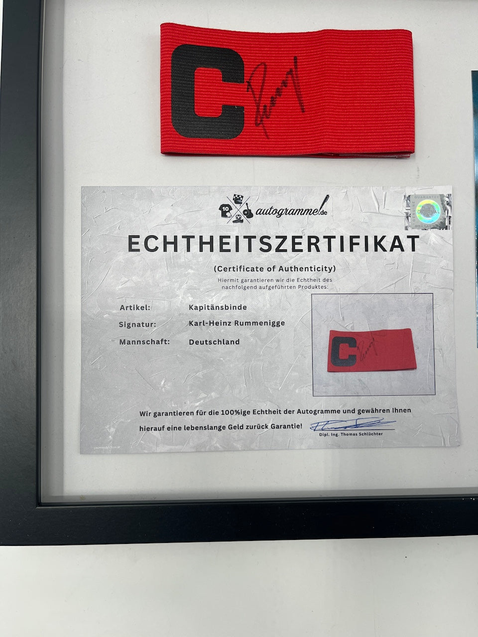 Captain's armband signed by Karl-Heinz Rummenigge in a DFB autograph COA frame