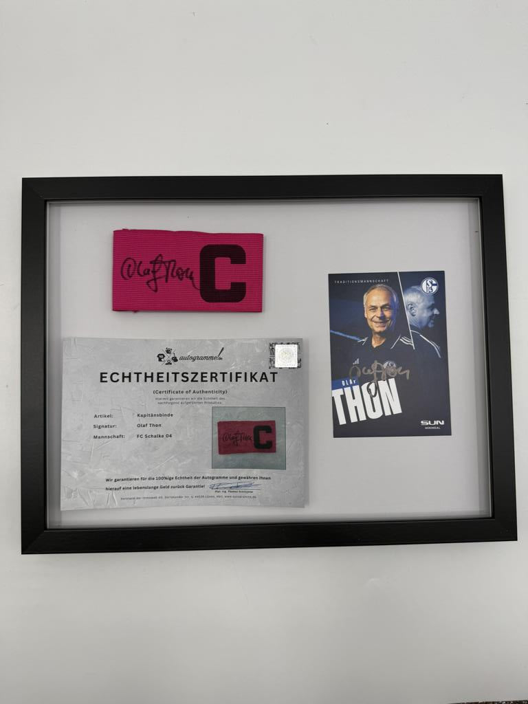 Kapitänsbinde Olaf Thon signiert im Rahmen Schalke 04 COA