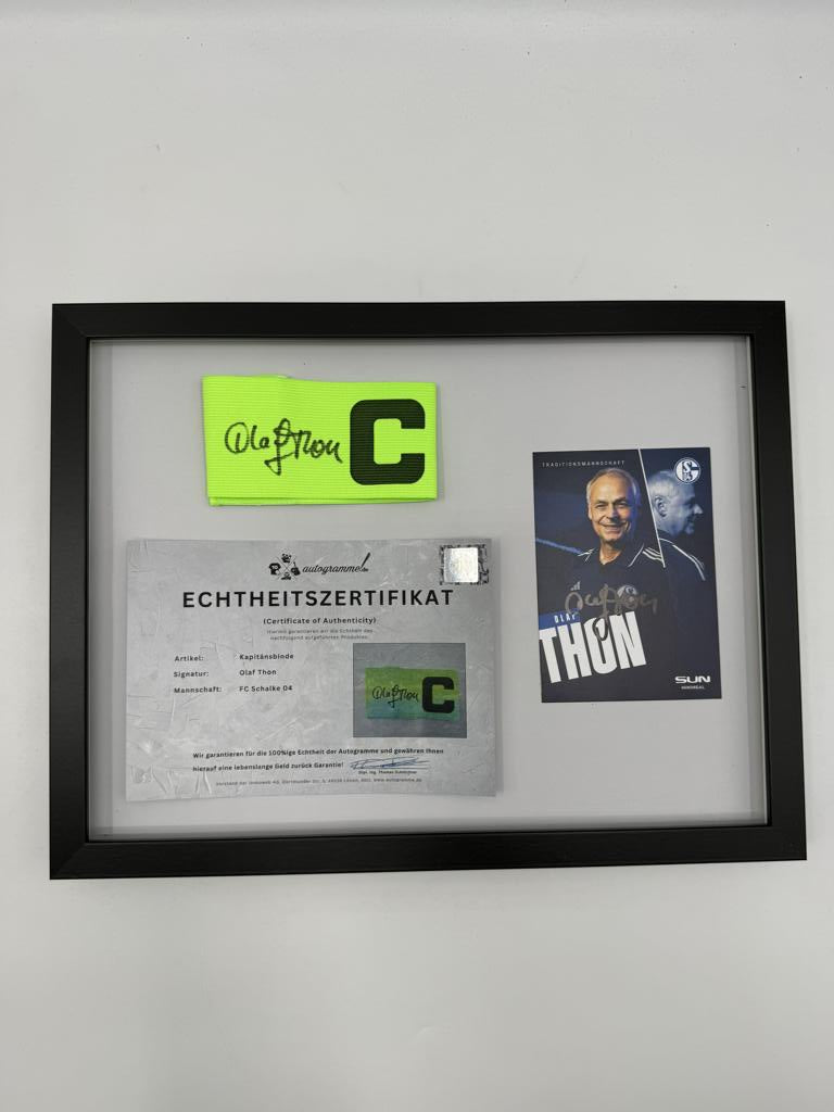 Kapitänsbinde Olaf Thon signiert im Rahmen Schalke 04 COA