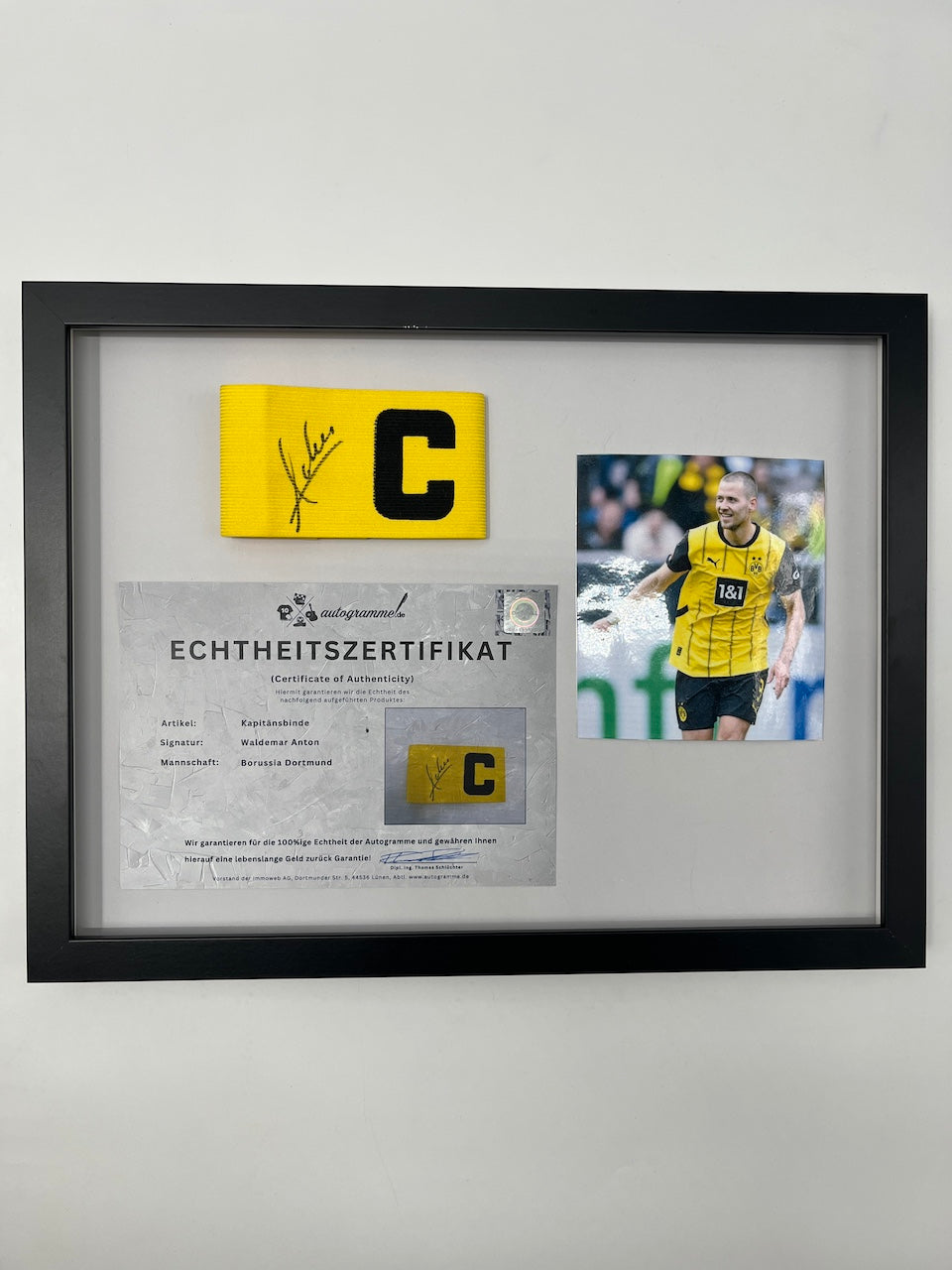 Captain's armband signed by Waldemar Anton in a new Borussia Dortmund COA (Certificate of Appointment)