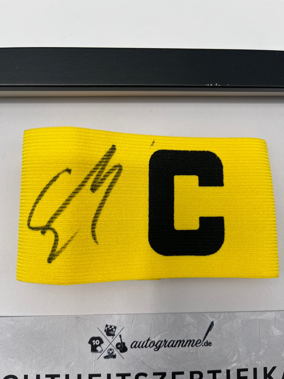 Captain's armband signed by Marcel Sabitzer as part of the Borussia Dortmund COA