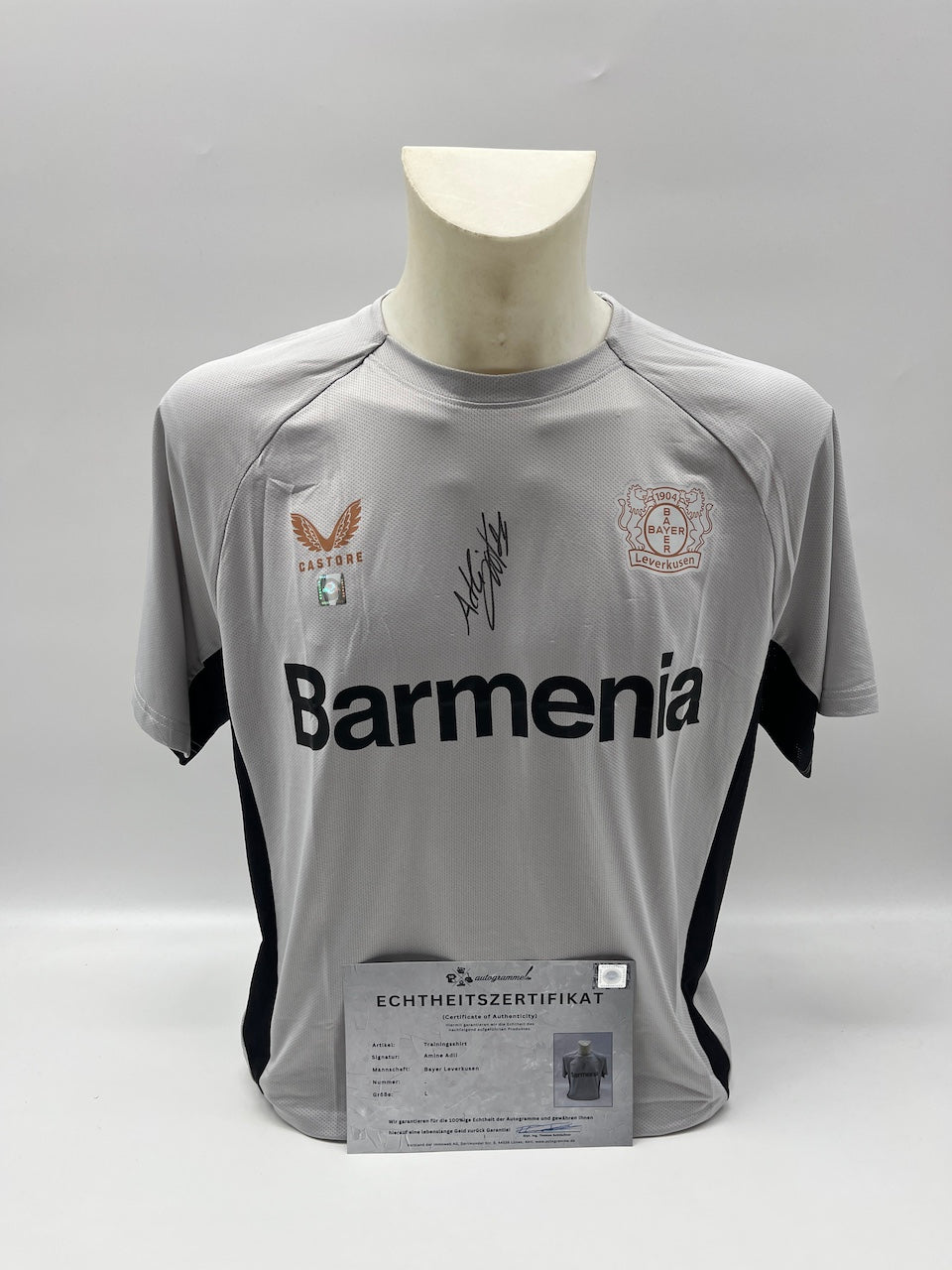 Bayer Leverkusen training shirt signed by Amine Adli, Castore L