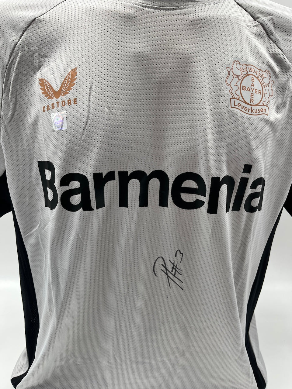 Bayer Leverkusen training shirt signed by Piero Hincapie, Castore L