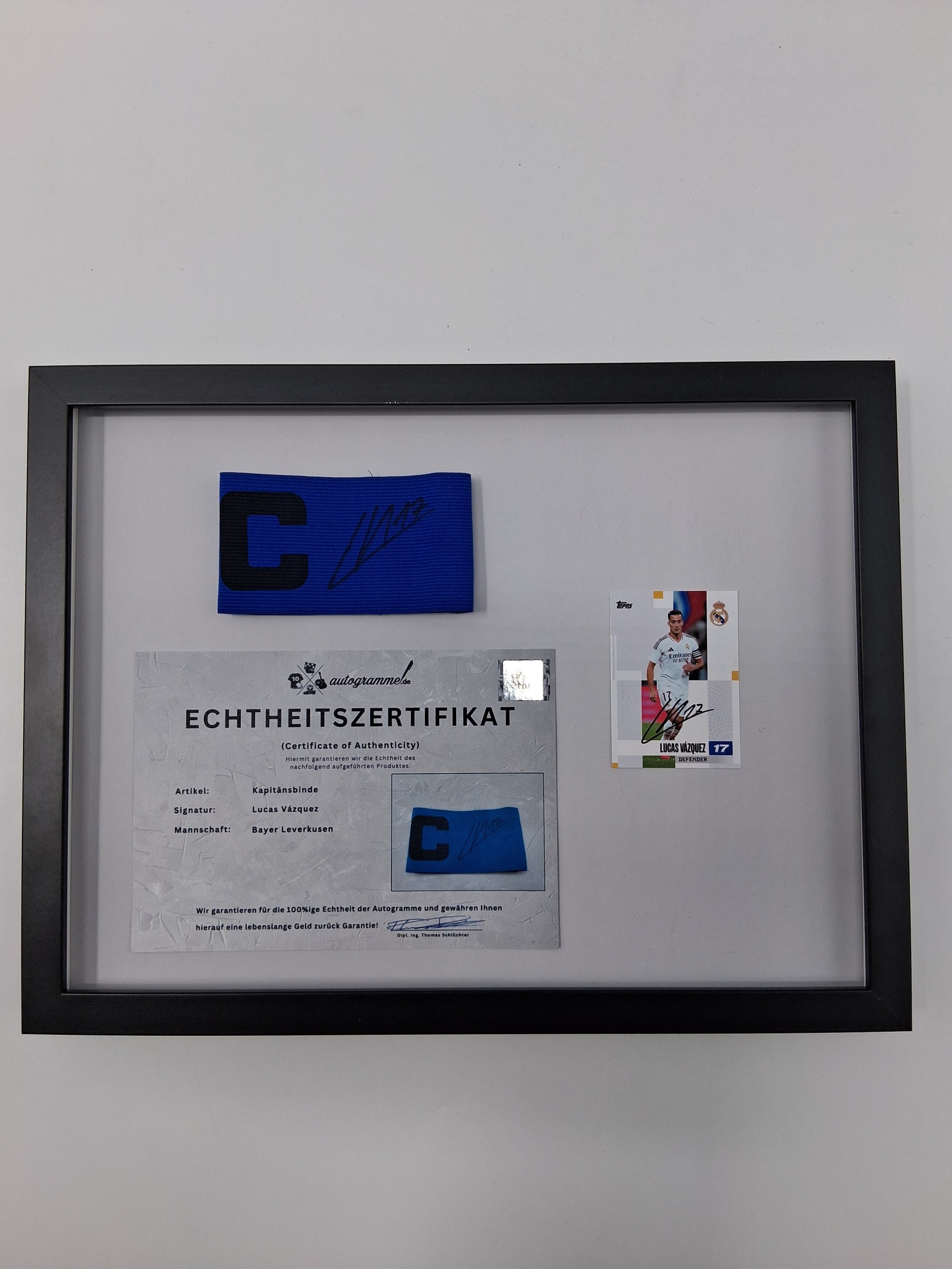 Captain's armband signed by Lucas Vázquez in a Real Madrid COA autograph frame