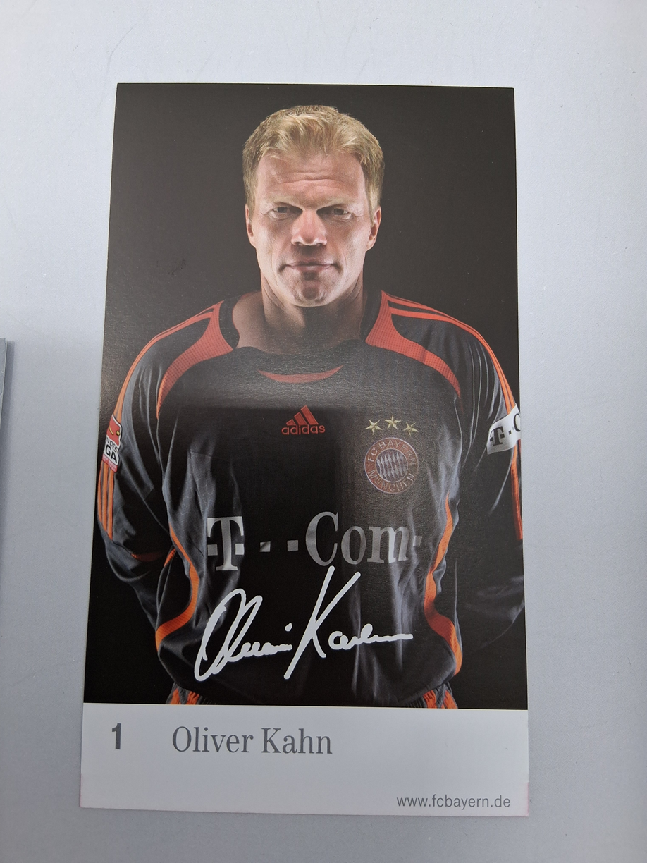 Captain's armband signed by Oliver Kahn in a Bayern Munich football autograph frame