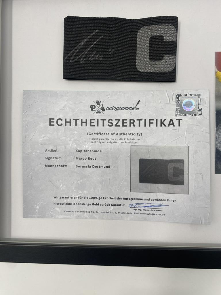 Captain's armband signed by Marco Reus in a Borussia Dortmund autograph COA frame