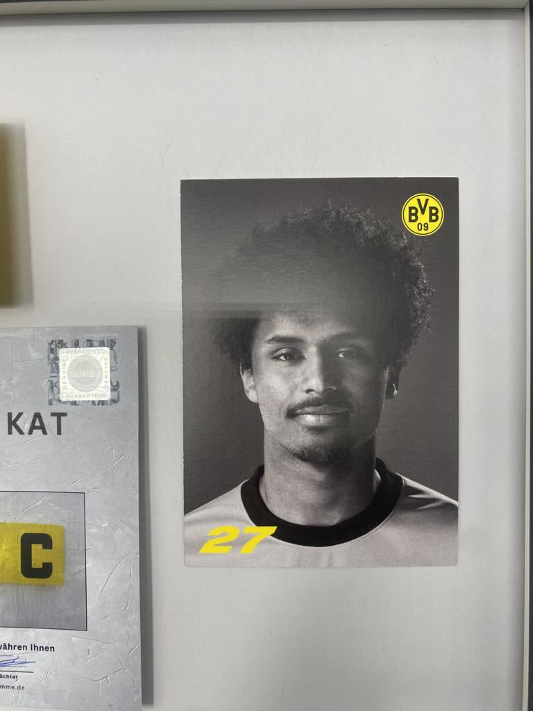 Captain's armband signed by Karim Adeyemi in a Borussia Dortmund autograph COA frame