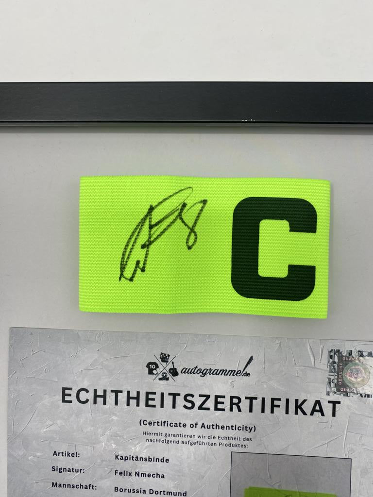 Captain's armband signed by Felix Nmecha as part of the Borussia Dortmund COA