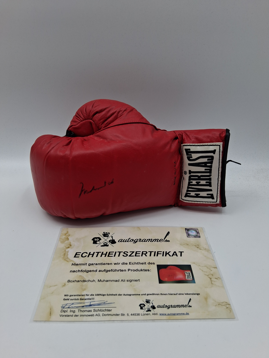 Boxing glove signed by Muhammad Ali, autographed.