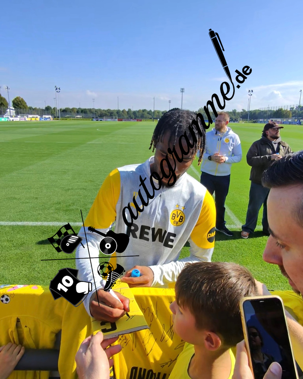 Captain's armband signed by Carney Chukwuemeka in a Borussia Dortmund autograph frame