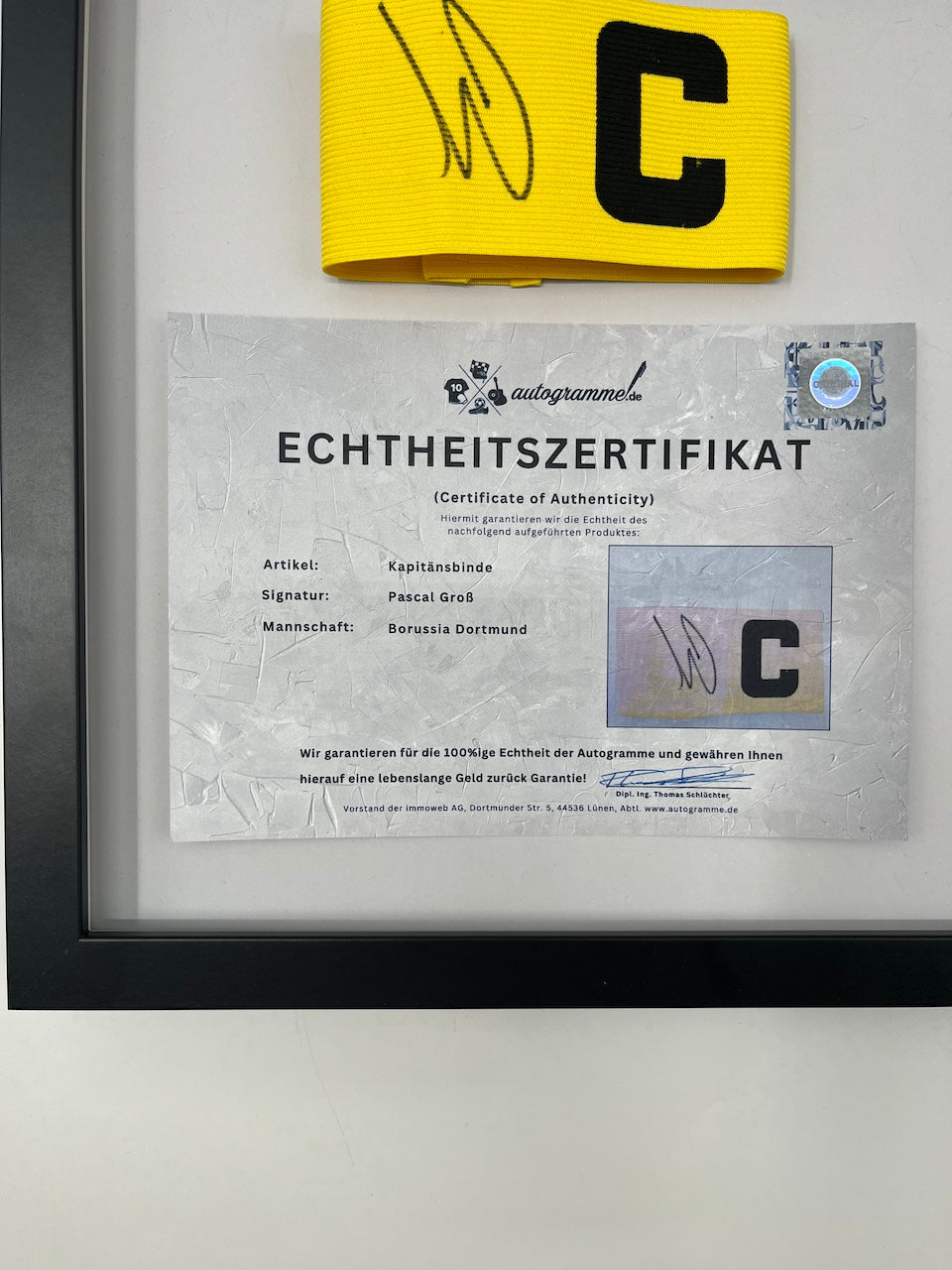 Captain's armband signed by Pascal Groß as part of the Borussia Dortmund COA