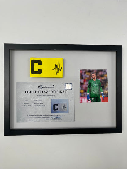 Captain's armband signed by Lucas Chevalier in a PSG COA frame