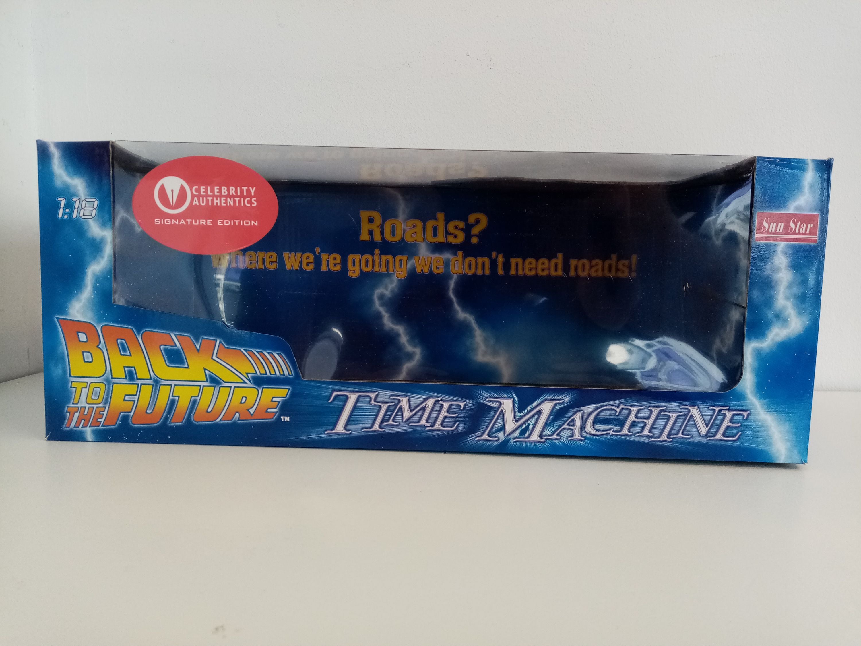 Back to the future model car signed by the actors of the film