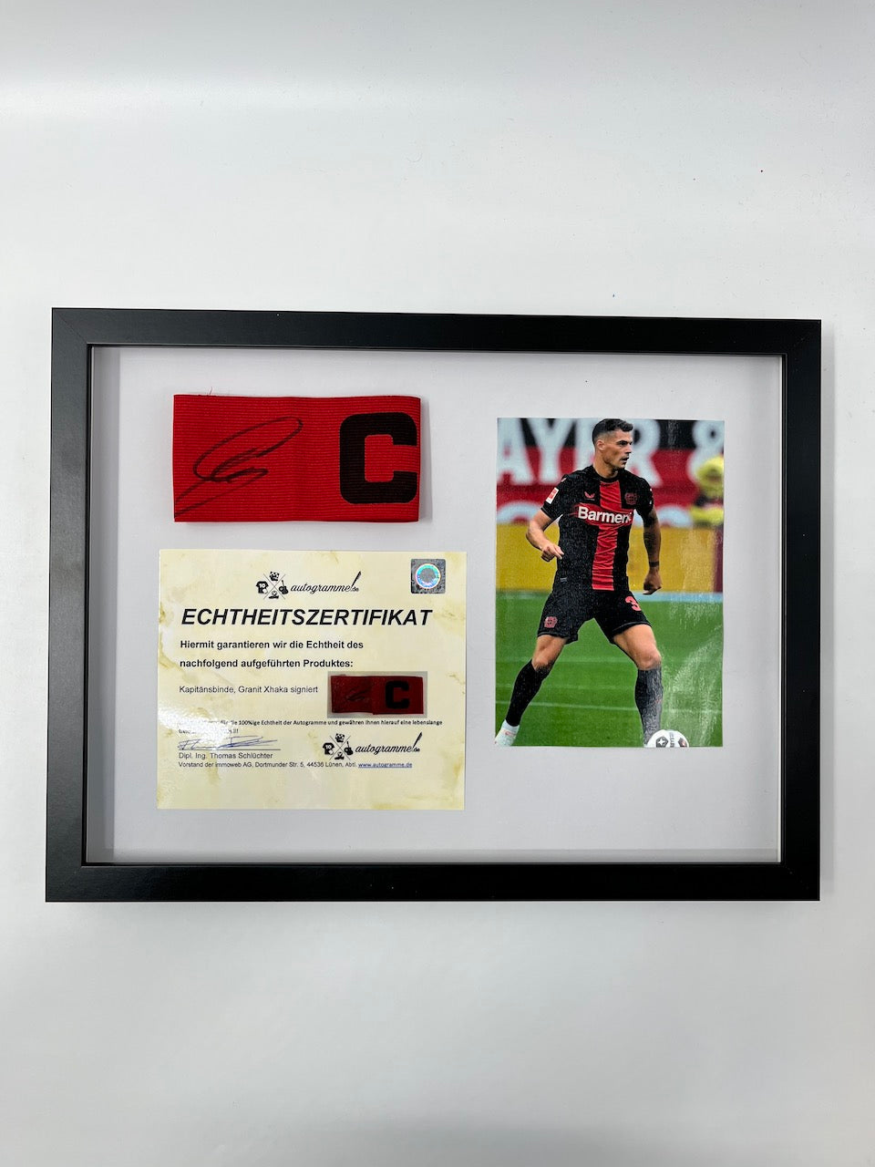 Captain's armband Granit Xhaka signed in the frame Leverkusen autograph