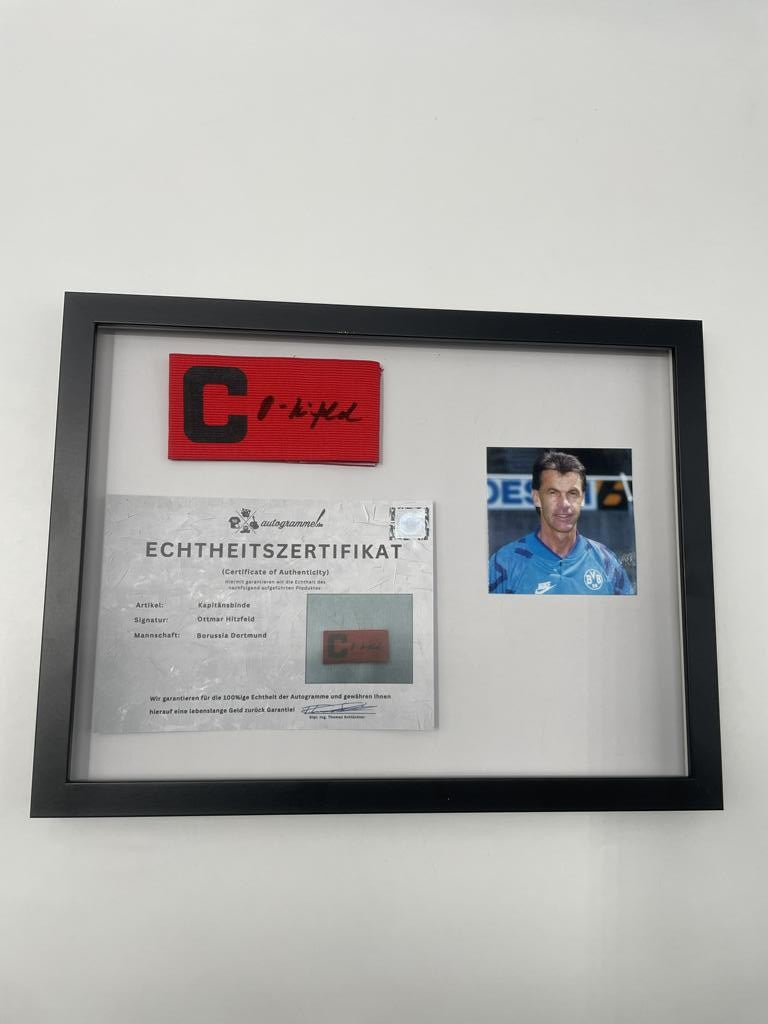 Captain's armband signed by Ottmar Hitzfeld in a Borussia Dortmund autograph COA frame