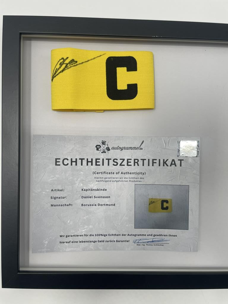 Captain's armband signed by Daniel Svensson in a Borussia Dortmund autograph COA frame