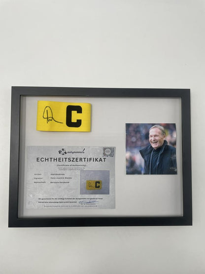 Kapitänsbinde Hans-Joachim Watzke signiert im Rahmen Borussia Dortmund COA
