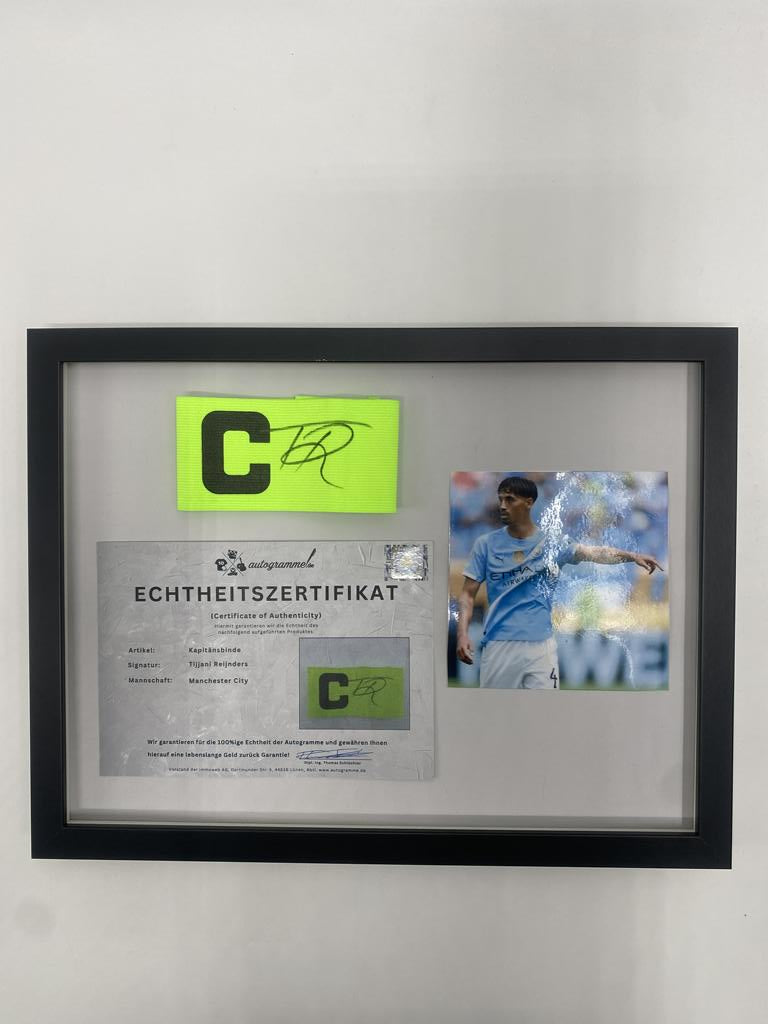 Captain's armband signed by Tijjani Reijnders as part of the Manchester City Football COA