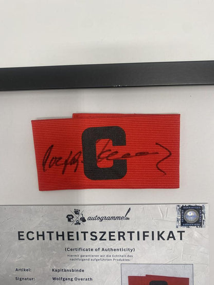 Kapitänsbinde Wolfgang Overath signiert im Rahmen 1. FC Köln Autogramm COA