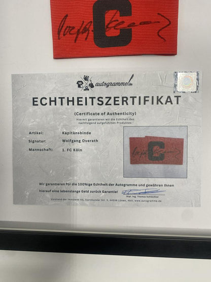 Kapitänsbinde Wolfgang Overath signiert im Rahmen 1. FC Köln Autogramm COA
