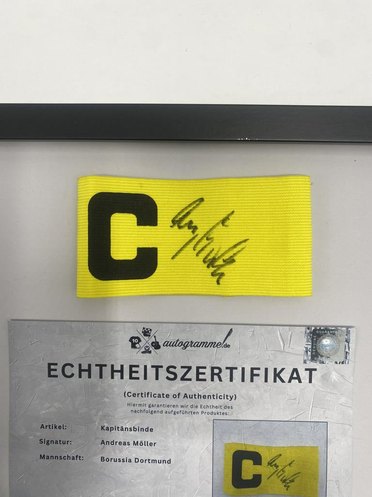 Captain's armband signed by Andreas Möller in a BVB autograph COA frame