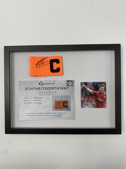 Captain's armband signed by Xabi Alonso in a framed FC Liverpool autograph COA
