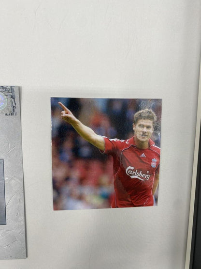 Captain's armband signed by Xabi Alonso in a framed FC Liverpool autograph COA