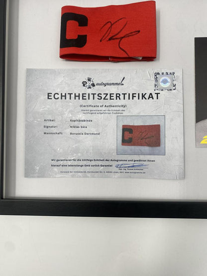 Captain's armband signed by Niklas Süle as part of the Borussia Dortmund COA football campaign