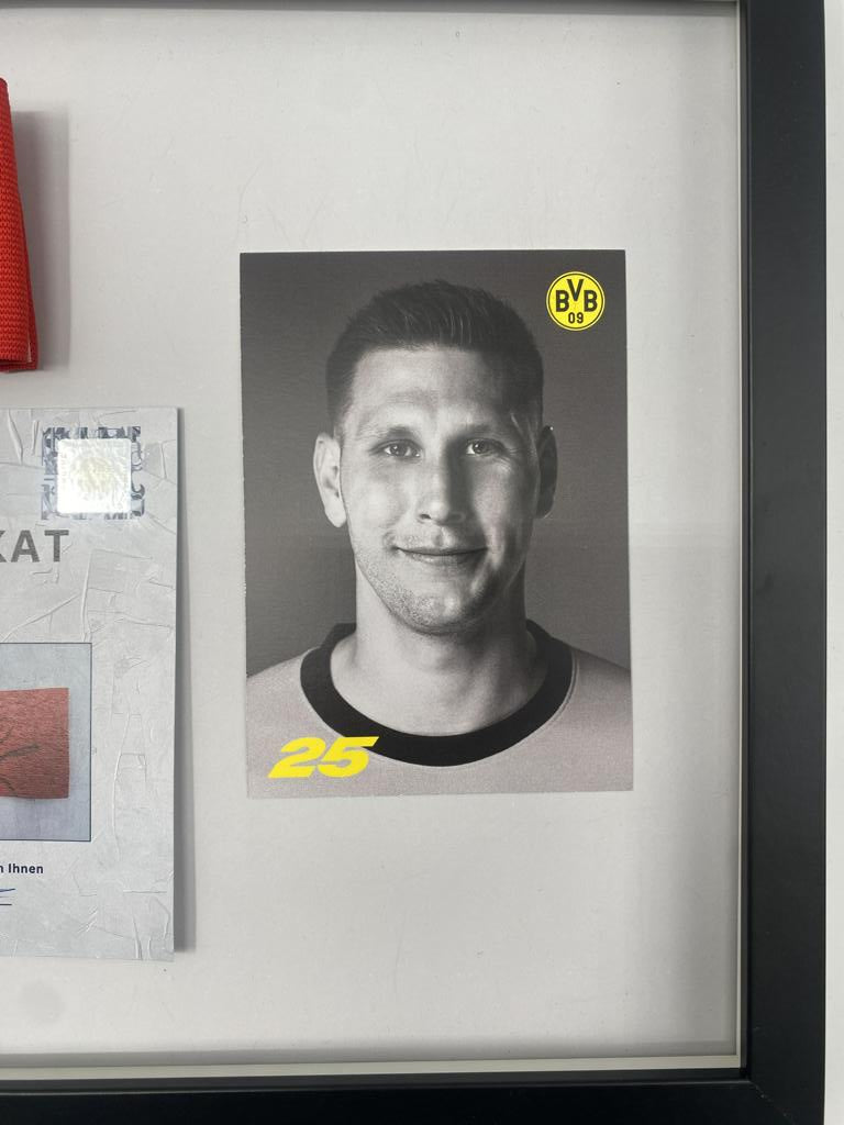 Captain's armband signed by Niklas Süle as part of the Borussia Dortmund COA football campaign