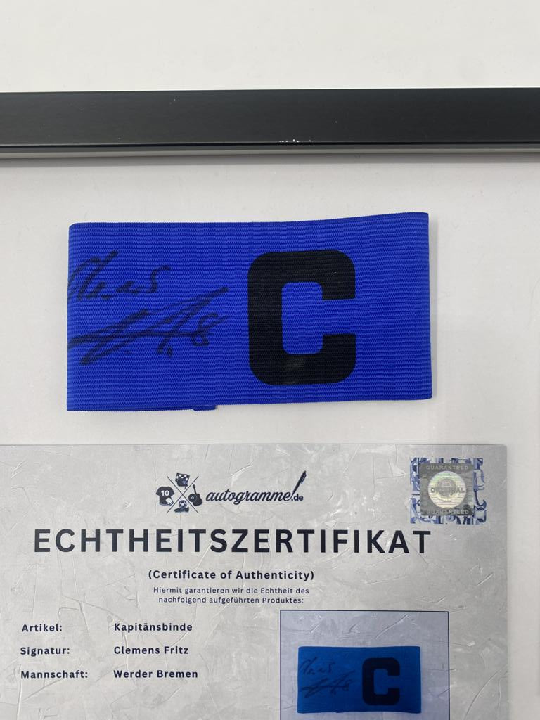 Captain's armband signed by Clemens Fritz in the Werder Bremen COA football frame