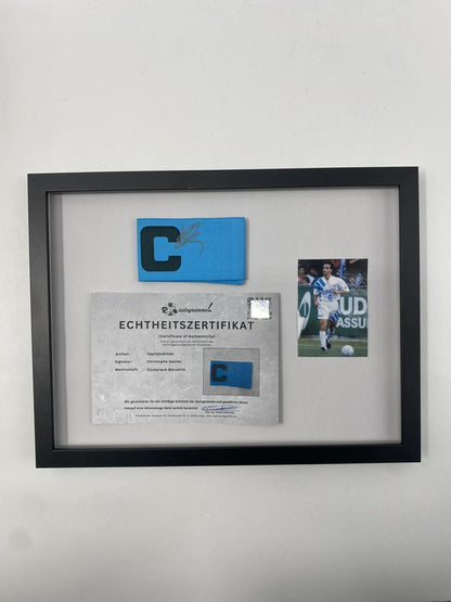 Brazalete de capitán firmado por Christophe Galtier en un COA del Olympique de Marsella enmarcado