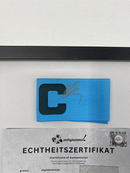 Brazalete de capitán firmado por Christophe Galtier en un COA del Olympique de Marsella enmarcado