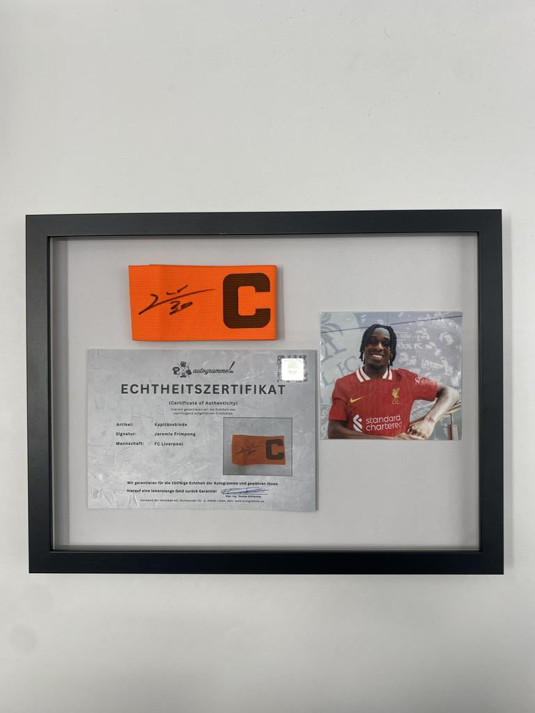 Brazalete de capitán firmado por Jeremie Frimpong en un marco con autógrafo del FC Liverpool