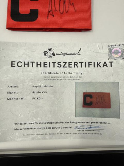 Kapitänsbinde Armin Veh signiert im Rahmen 1. FC Köln Autogramm