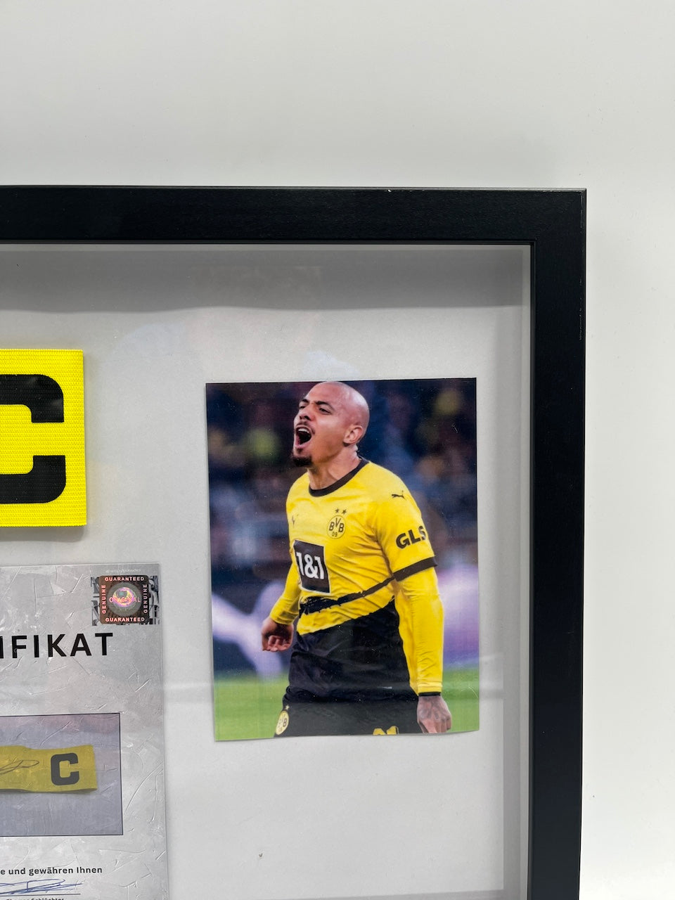 Kapitänsbinde Donyell Malen signiert im Rahmen Borussia Dortmund Autogramm COA