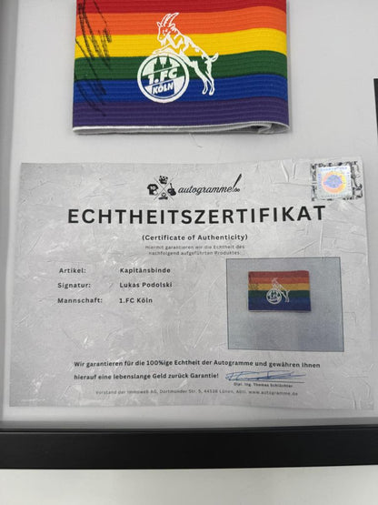 Kapitänsbinde Lukas Podolski signiert im Rahmen Deutschland/1.FC Köln COA