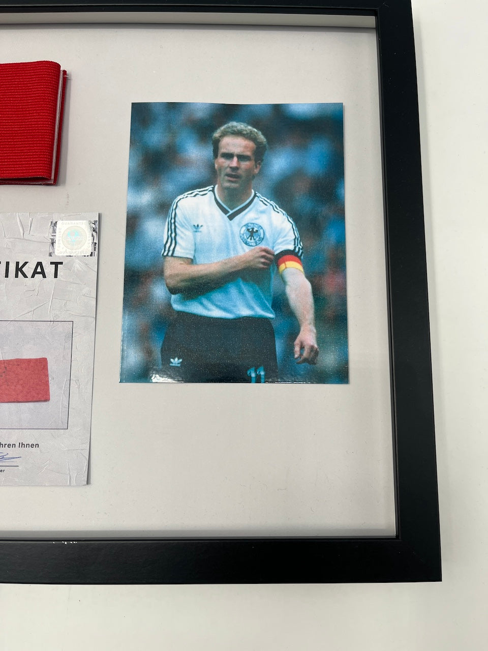 Captain's armband signed by Karl-Heinz Rummenigge in a DFB autograph COA frame